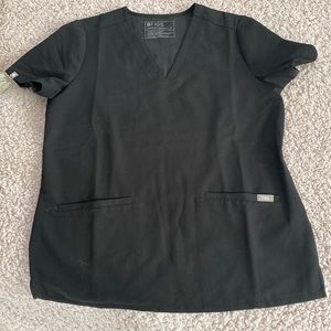 Figs scrub top worn a few times. No stains or tear. Great condition